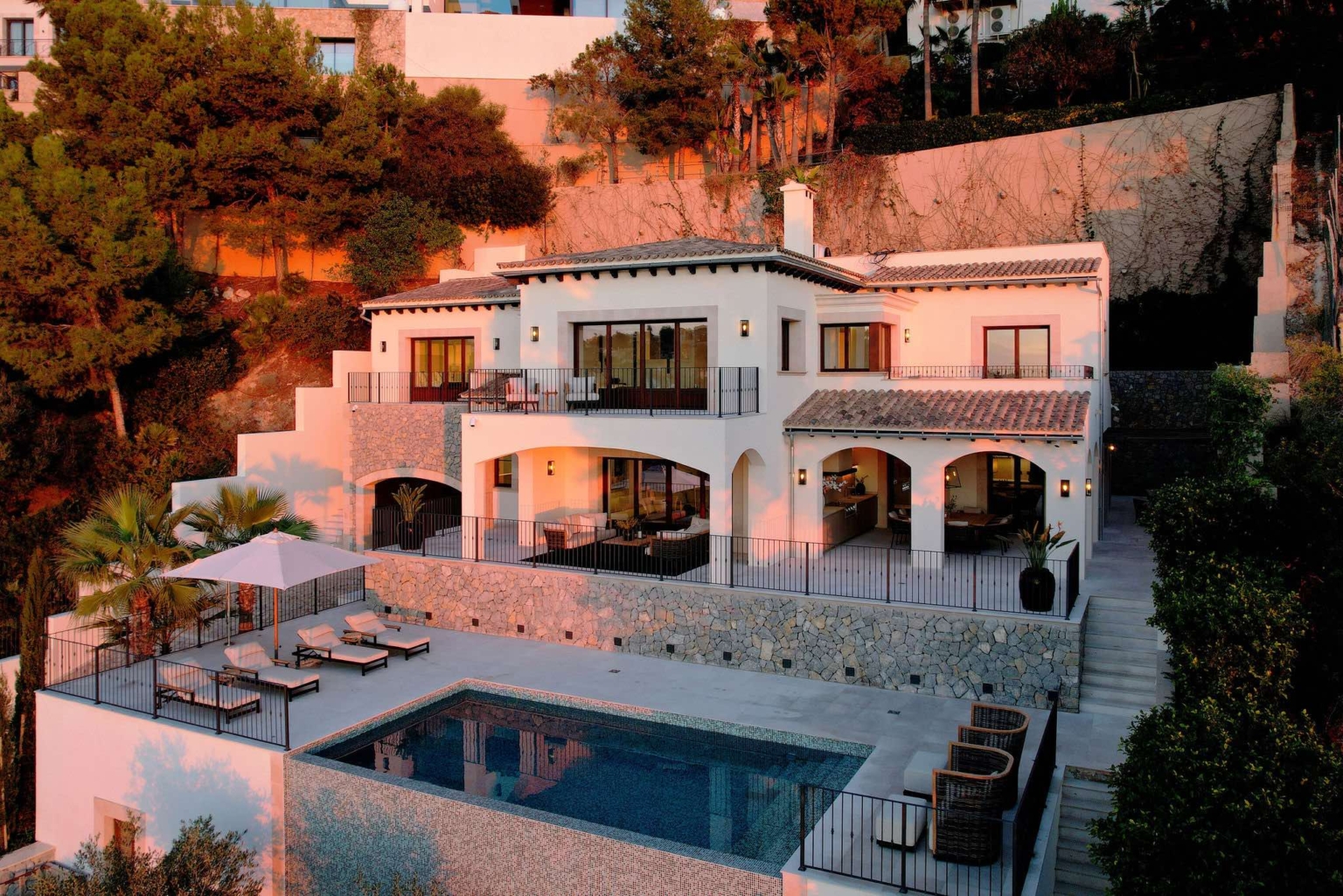 Luxury frontline villa exterior in Cala Llamp, Puerto Andratx, Mallorca — modern Mediterranean architecture with private pool and sea views