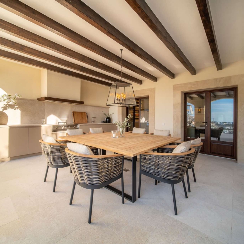Al fresco dining terrace overlooking the bay of Cala Llamp at luxury villa for sale, Puerto Andratx, Mallorca