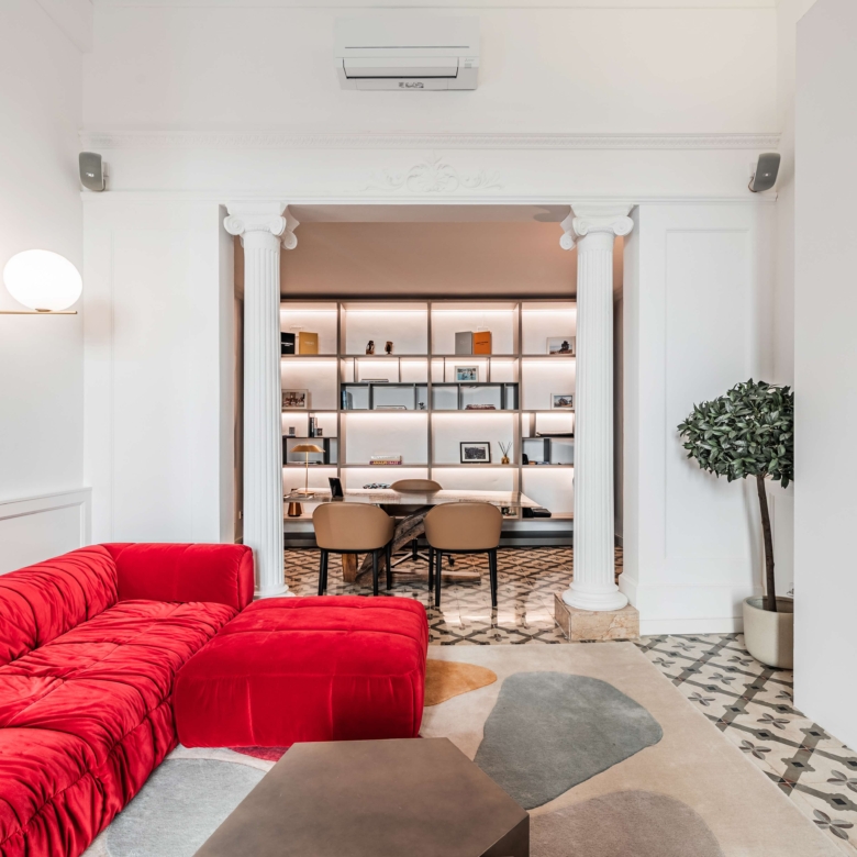 Grand reception room with soaring exposed beam ceilings and bar area in Mallorca duplex